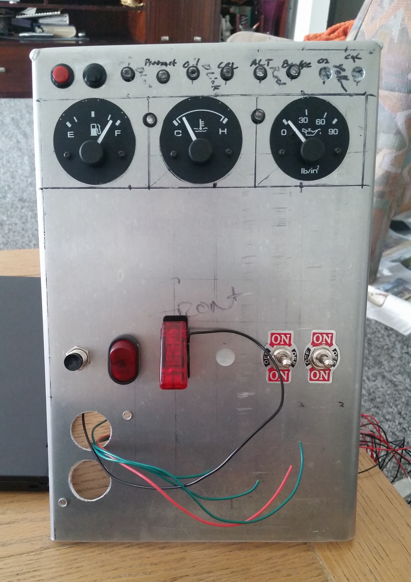 Mocking up a switch panel for the center of the car.